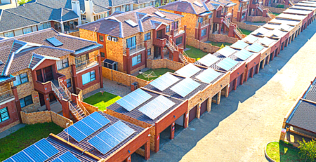 Solar panels on the roofs of garages and units in a sectional title scheme