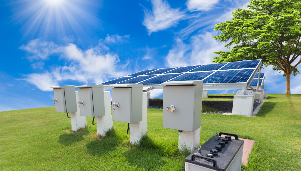 Solar panels and battery energy storage units in a sunny field